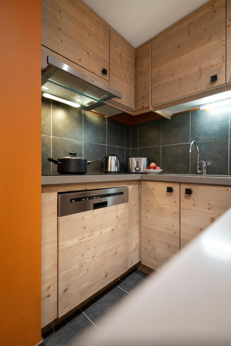 Cuisine ou kitchenette dans l'établissement Résidence Pierre & Vacances Premium Les Terrasses d'Hélios