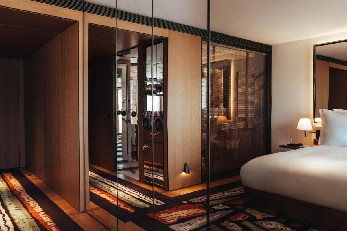 Un ou plusieurs lits dans un hébergement de l'établissement Hotel SAX Paris, LXR Hotels & Resorts