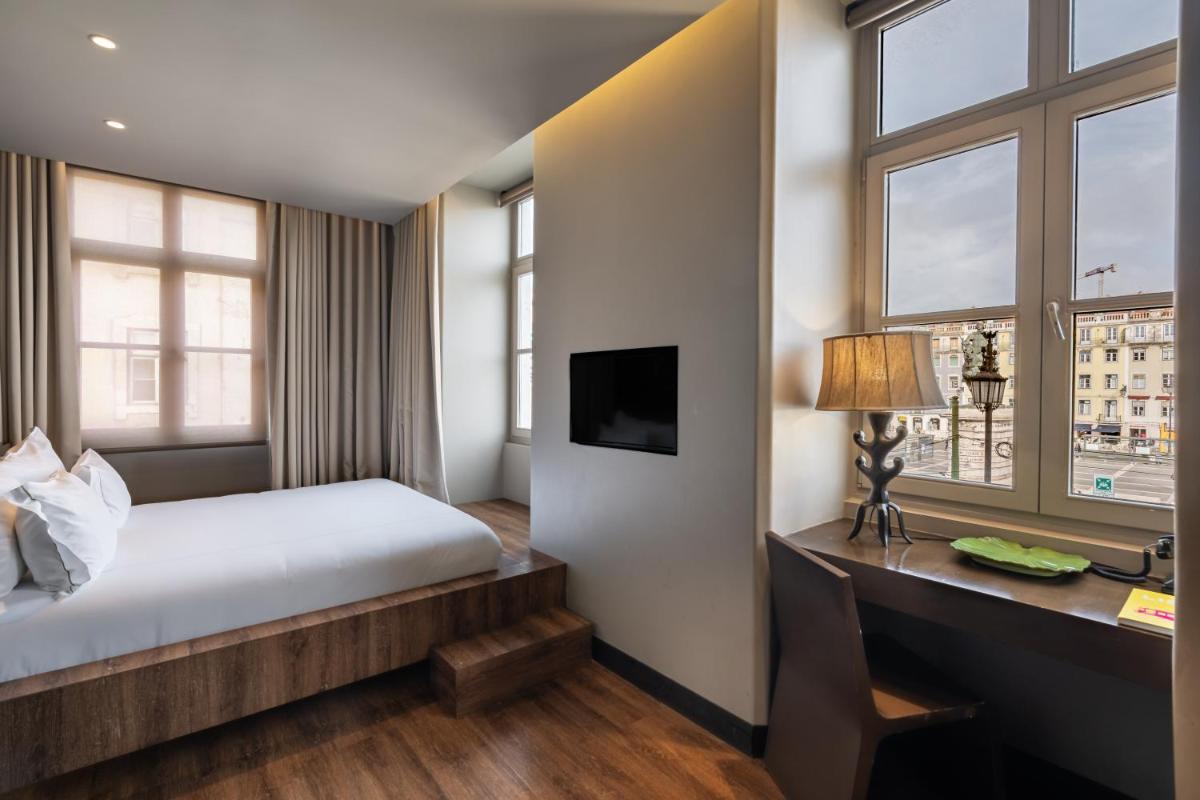 Uma cama ou camas num quarto em Figueira by The Beautique Hotels & Spa