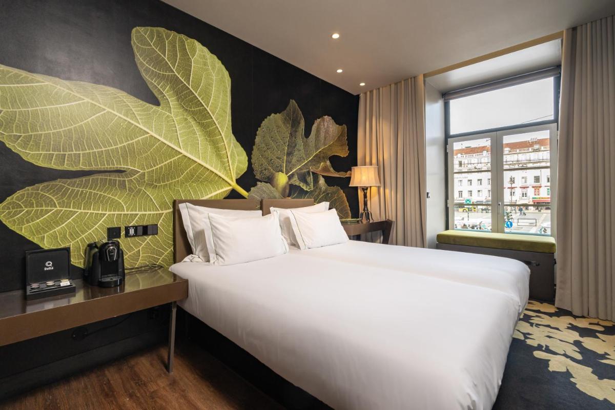 Uma cama ou camas num quarto em Figueira by The Beautique Hotels & Spa