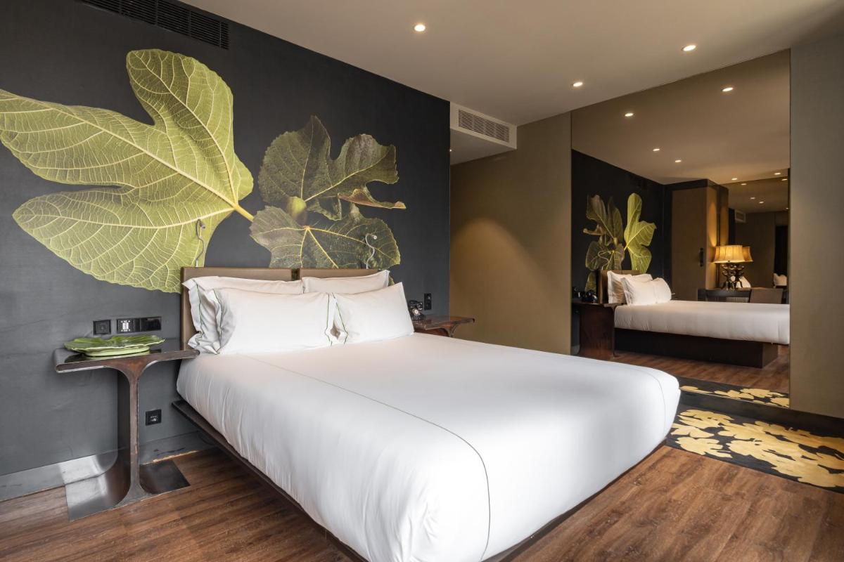 Uma cama ou camas num quarto em Figueira by The Beautique Hotels & Spa