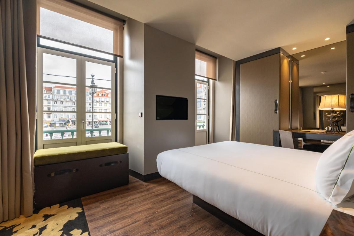 Uma cama ou camas num quarto em Figueira by The Beautique Hotels & Spa