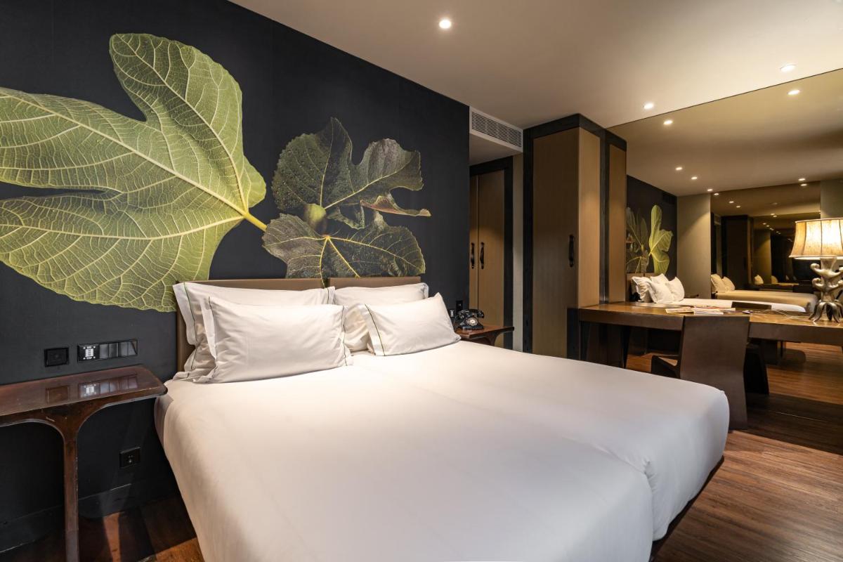 Uma cama ou camas num quarto em Figueira by The Beautique Hotels & Spa