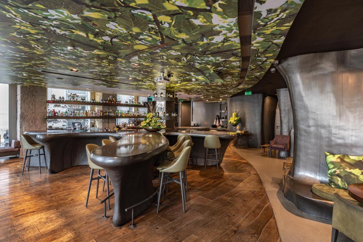 Um restaurante ou outro lugar para comer em Figueira by The Beautique Hotels & Spa