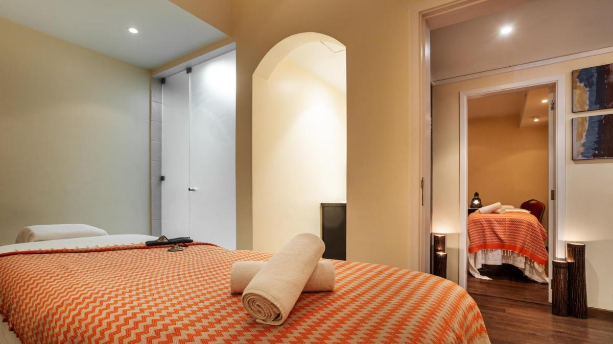Uma cama ou camas num quarto em Pestana Alvor Praia Premium Beach & Golf Resort