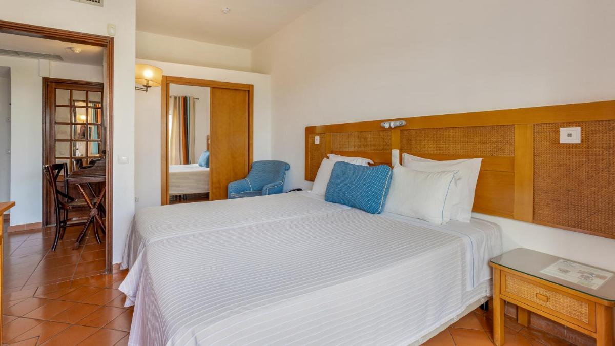 Uma cama ou camas num quarto em Hotel do Cerro