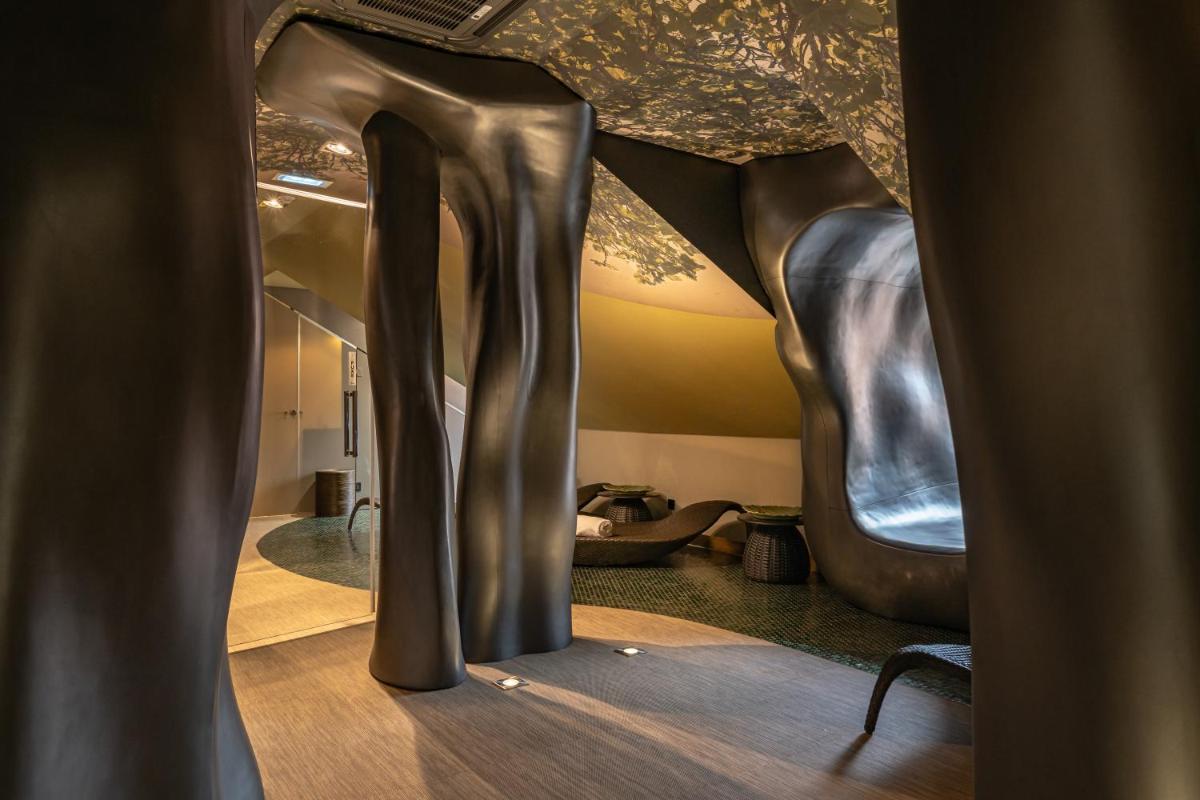 Uma cama ou camas num quarto em Figueira by The Beautique Hotels & Spa