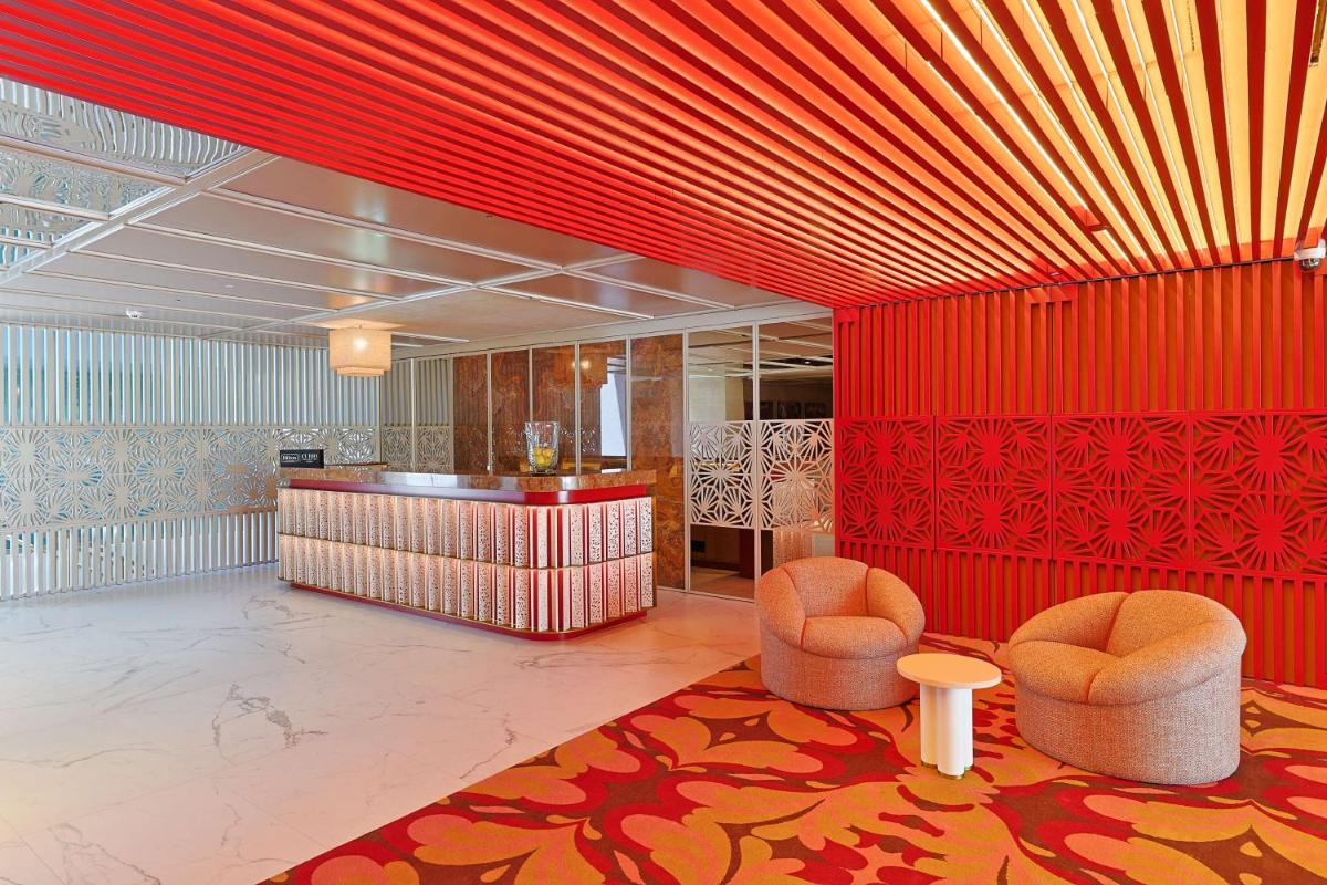 Uma área de estar em Legacy Hotel Cascais, Curio Collection By Hilton