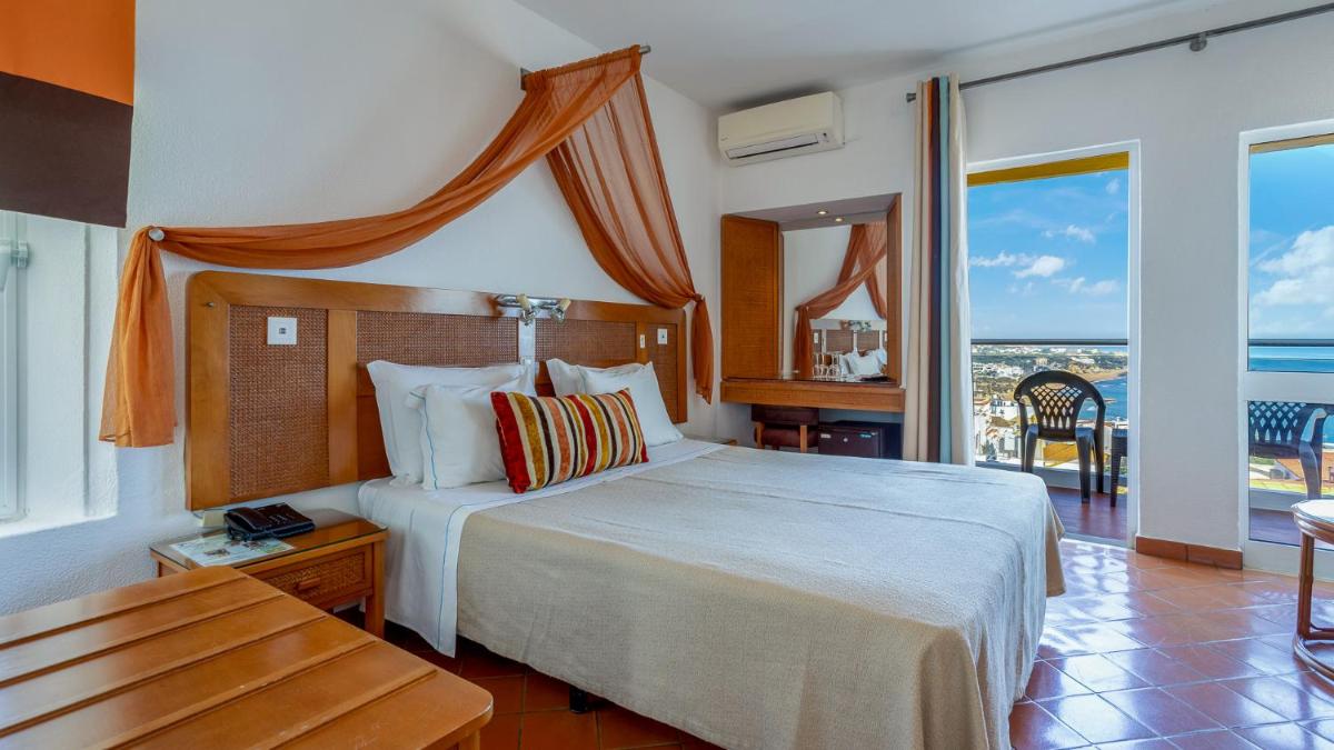Uma cama ou camas num quarto em Hotel do Cerro