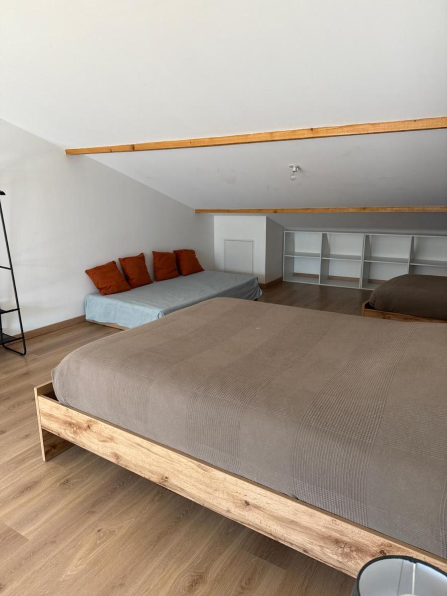 Appartements neufs avec garages dans maison de village - Hizvo