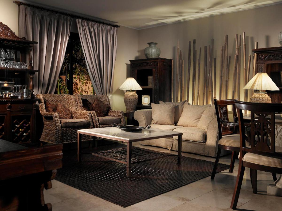 Zona de estar de Royal Garden Villas, Luxury Hotel