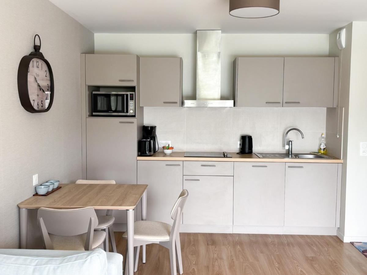 Cuisine ou kitchenette dans l'établissement Les Boréales - Appart'hotel & Restaurant