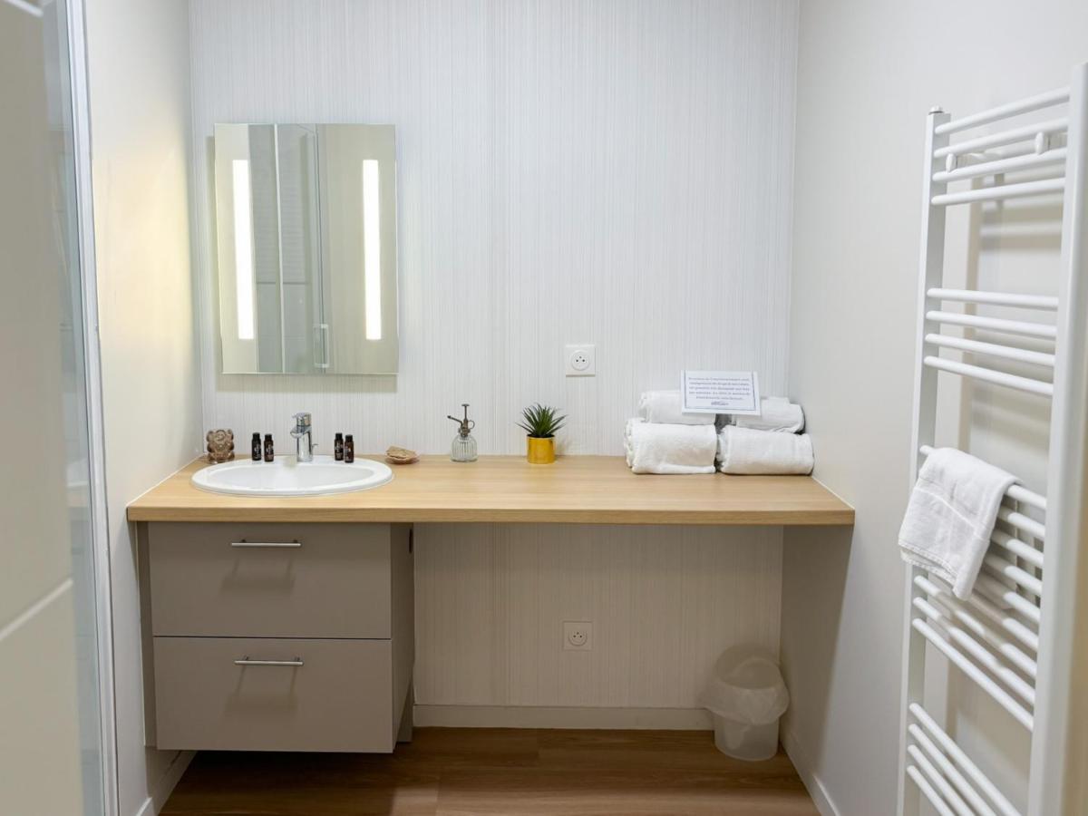 Salle de bains dans l'établissement Les Boréales - Appart'hotel & Restaurant