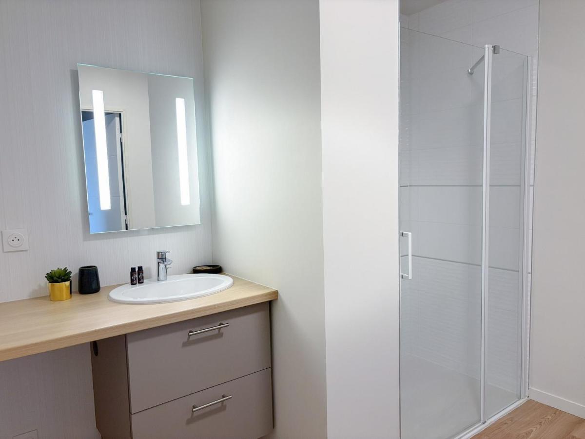 Salle de bains dans l'établissement Les Boréales - Appart'hotel & Restaurant