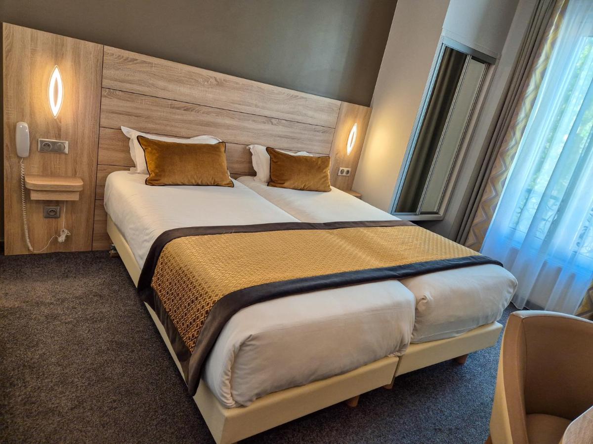 Hotel Champerret Elysees - Housity
