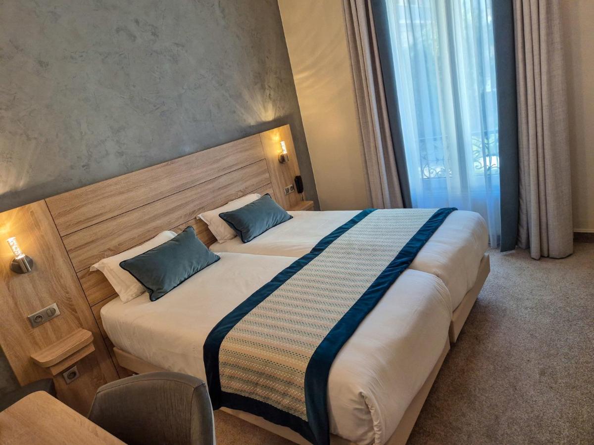 Hotel Champerret Elysees - Housity