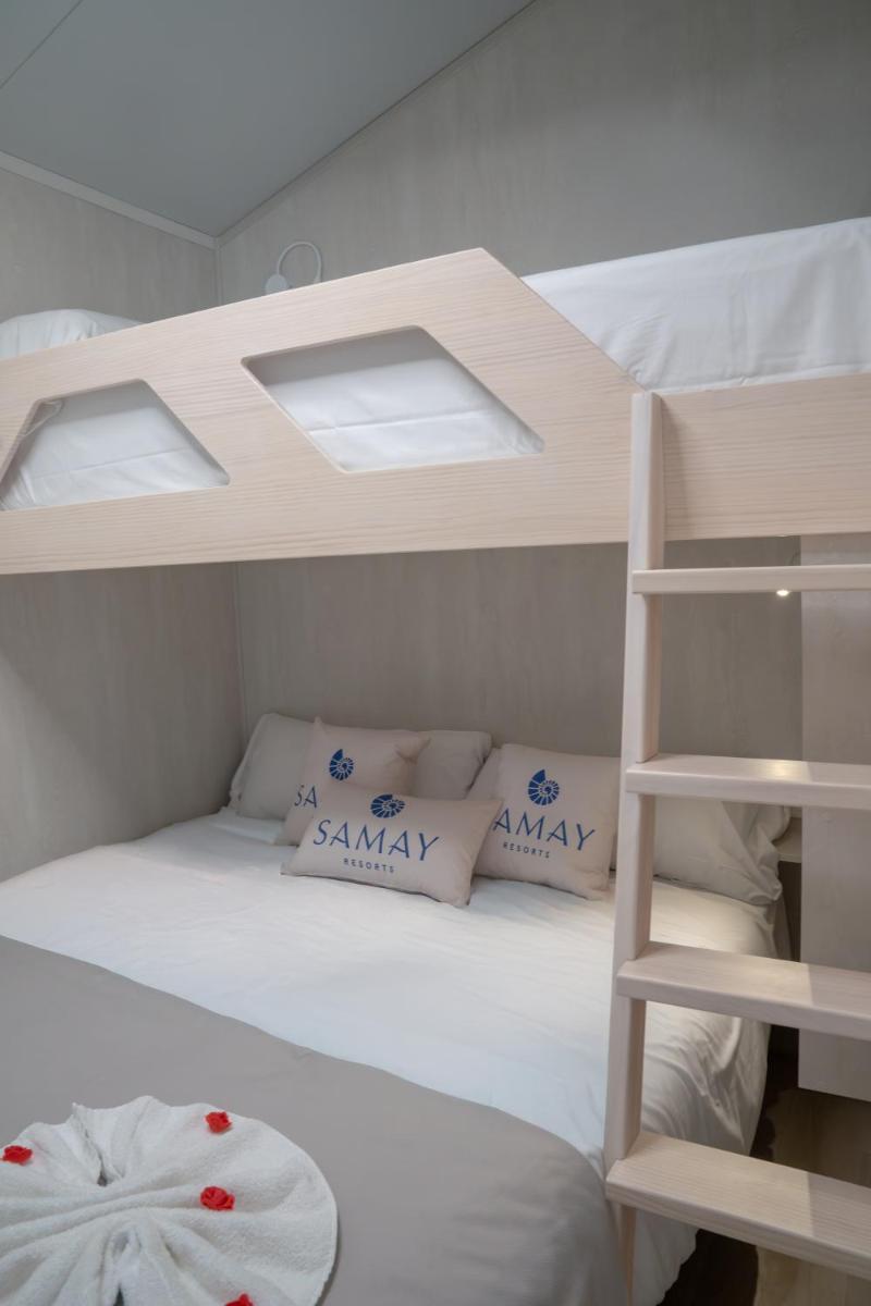 Cama o camas de una habitación en La Marina Resort