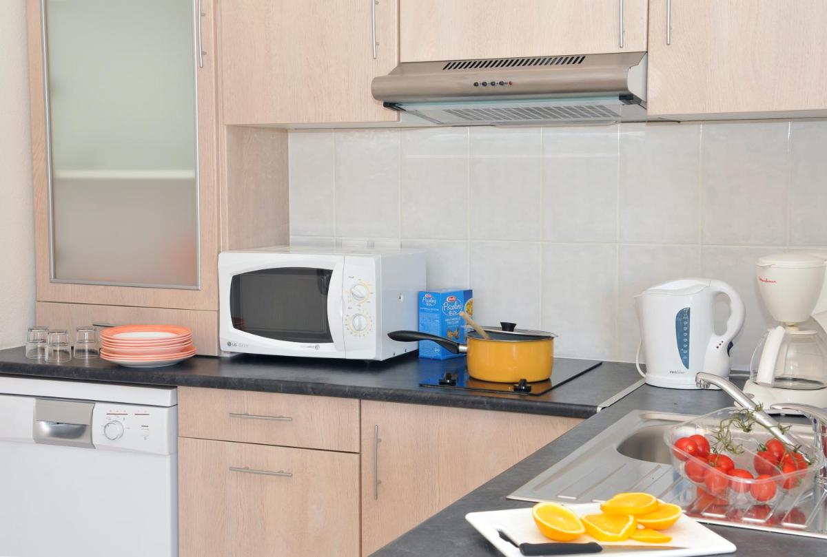 Cuisine ou kitchenette dans l'établissement Domaine d'Agrippa Valence