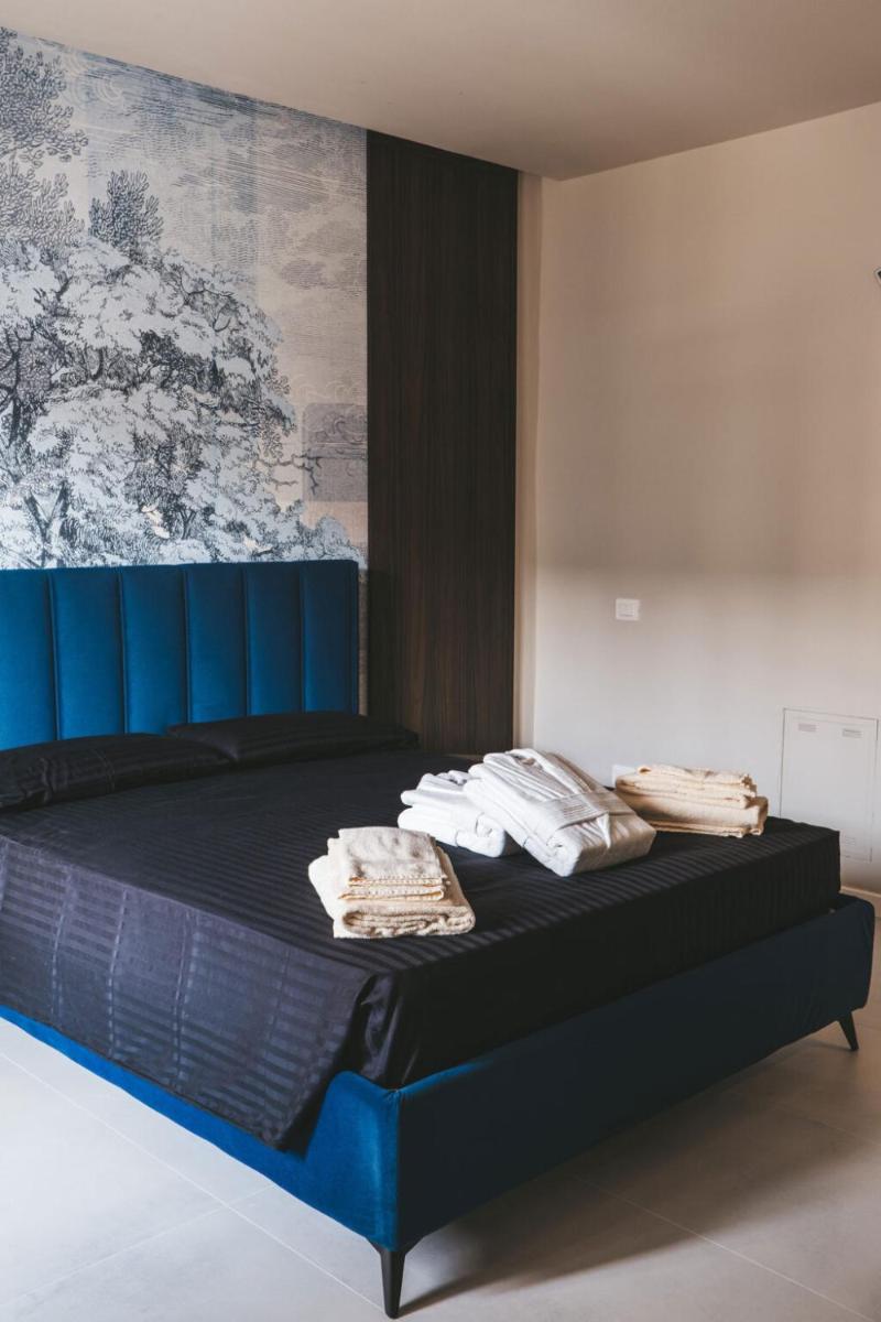 Tre Monumenti Luxury Suites - Housity