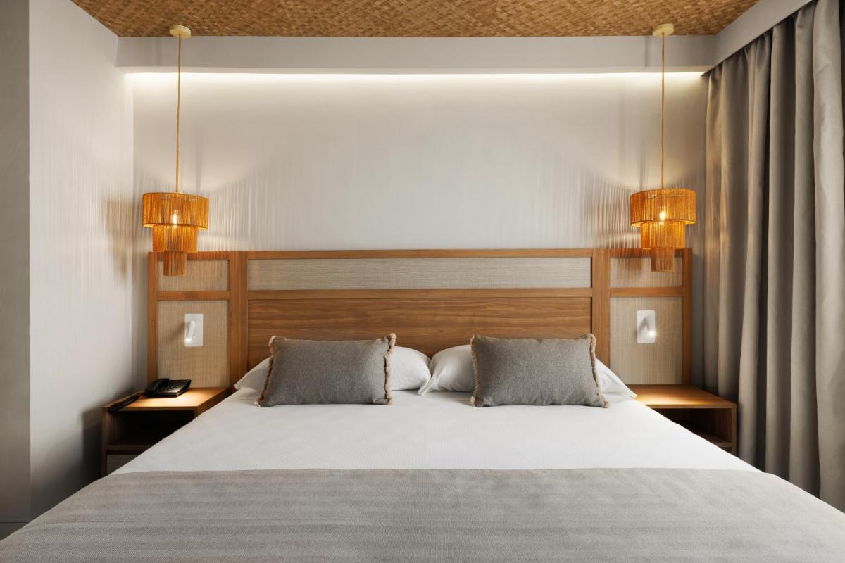 Cama o camas de una habitación en Hotel Riu Palace La Mola
