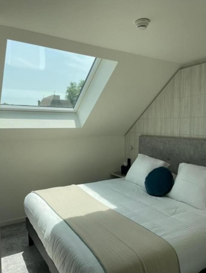 Un ou plusieurs lits dans un hébergement de l'établissement Domaine de Dolomieu Hotel & Spa - BW Premier Collection