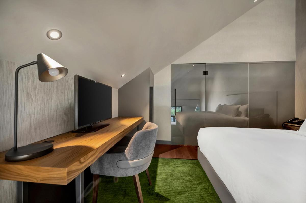 Uma cama ou camas num quarto em Hilton Porto Gaia