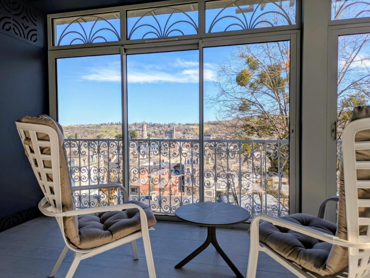 Balcon ou terrasse dans l'établissement Le Berceau de La Source