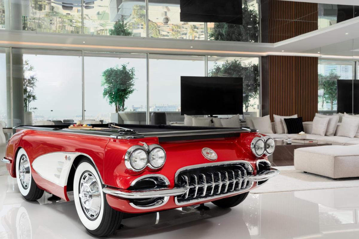 a red car parked in a living room at FIVE Palm Jumeirah Dubai in Dubai