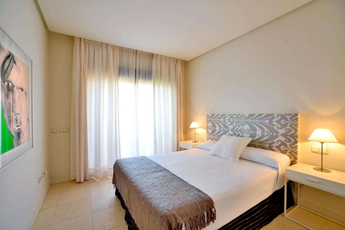 Cama o camas de una habitación en Aparthotel Novo Resort