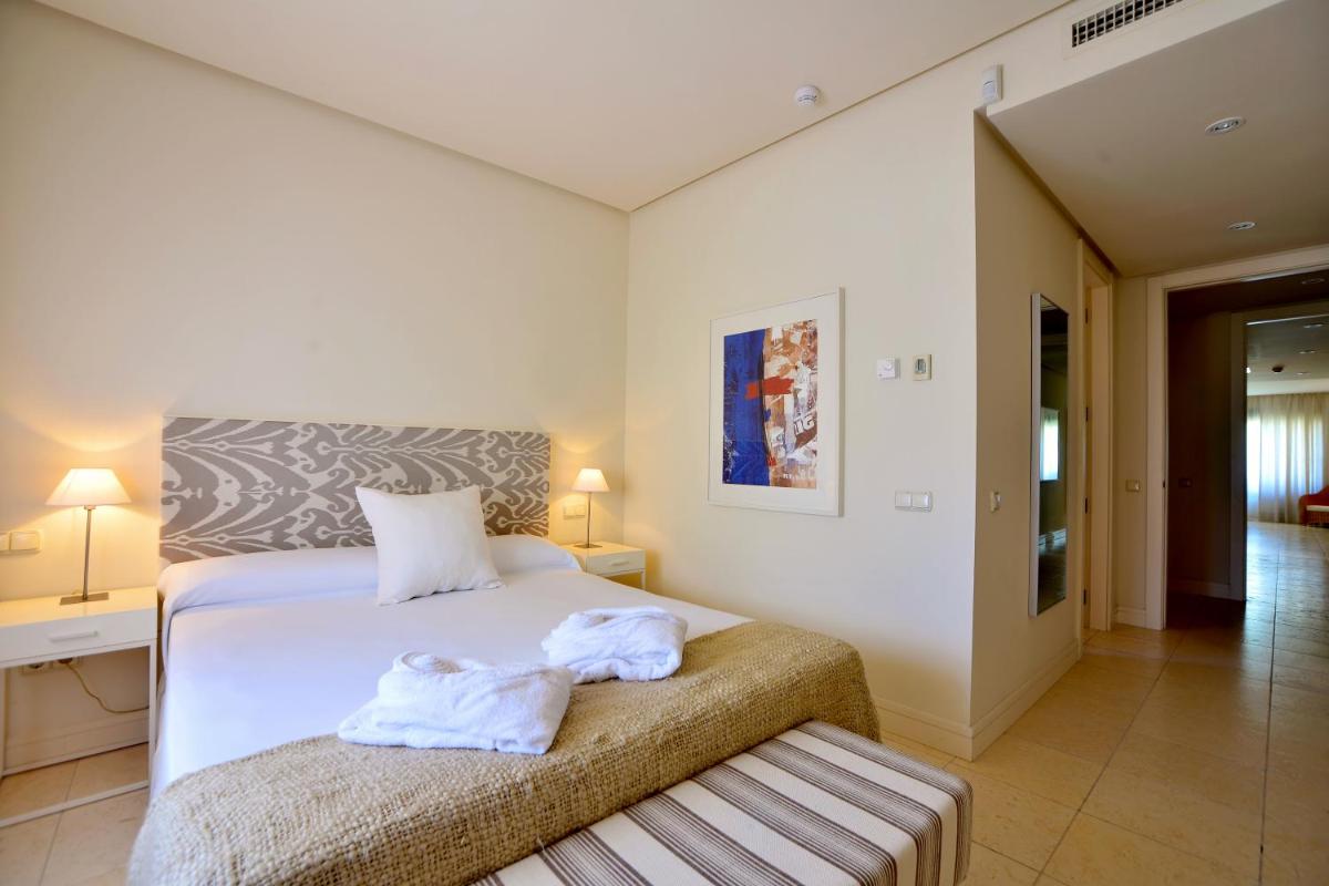 Cama o camas de una habitación en Aparthotel Novo Resort