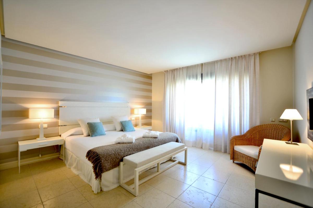 Cama o camas de una habitación en Aparthotel Novo Resort