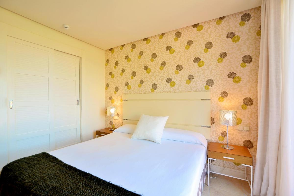 Cama o camas de una habitación en Aparthotel Novo Resort
