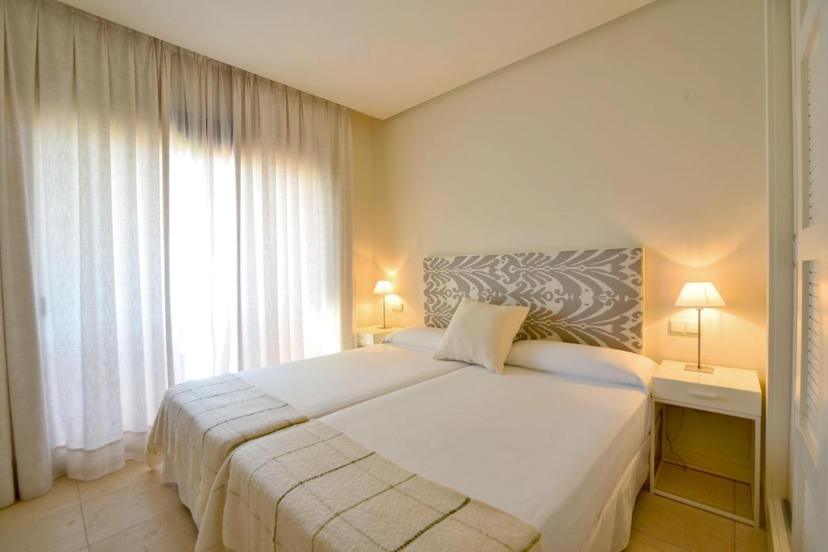 Cama o camas de una habitación en Aparthotel Novo Resort