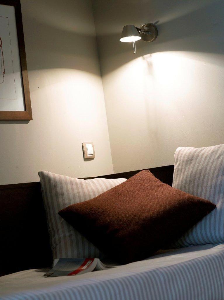 Cama o camas de una habitación en HG La Molina