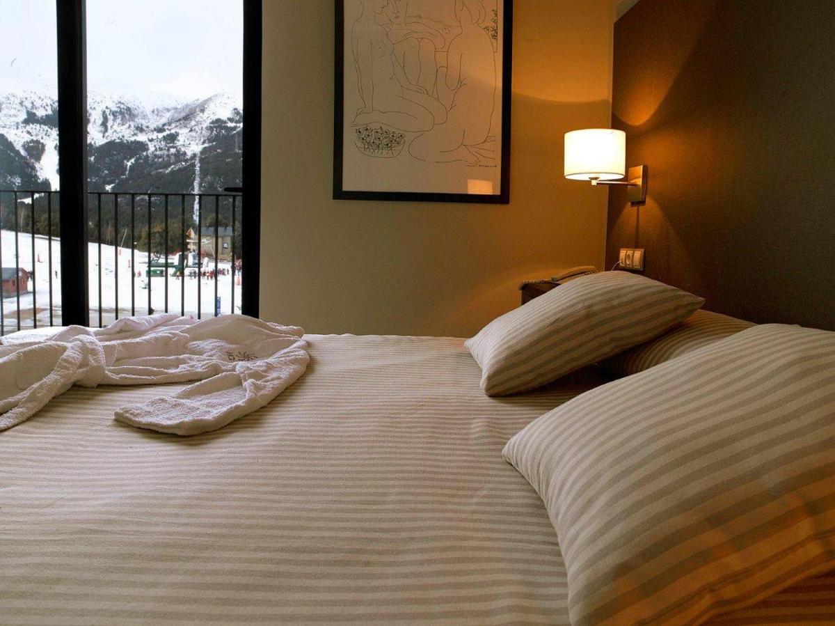 Cama o camas de una habitación en HG La Molina