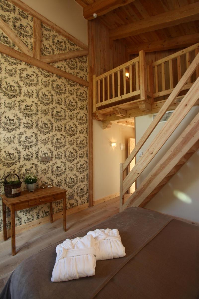 Cama o camas de una habitación en Hotel Viñas de Lárrede
