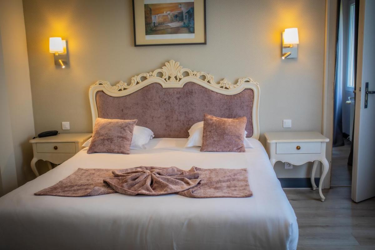 Un ou plusieurs lits dans un hébergement de l'établissement Alexain Hotel Restaurant & Wellness - Colmar Ouest