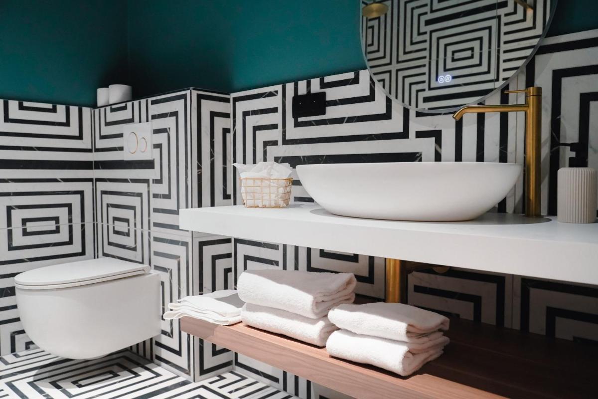 Salle de bains dans l'établissement Hôtel Fesch & Spa
