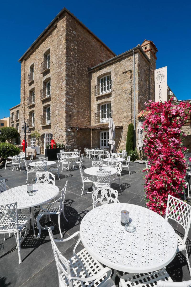 Restaurant ou autre lieu de restauration dans l'établissement Hôtel L'Abbaye