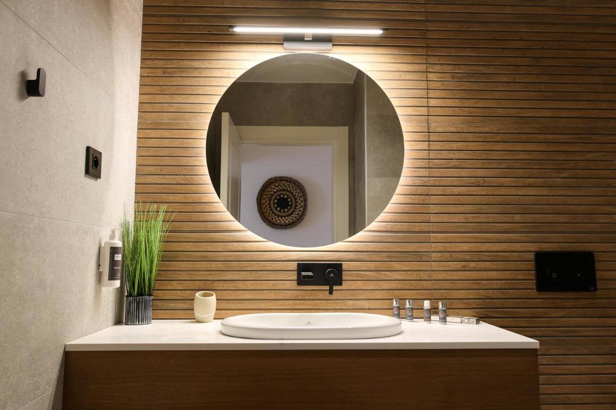 Salle de bains dans l'établissement Les Rêveries du Clos POMMARD Vignes & SPA& Dégustation
