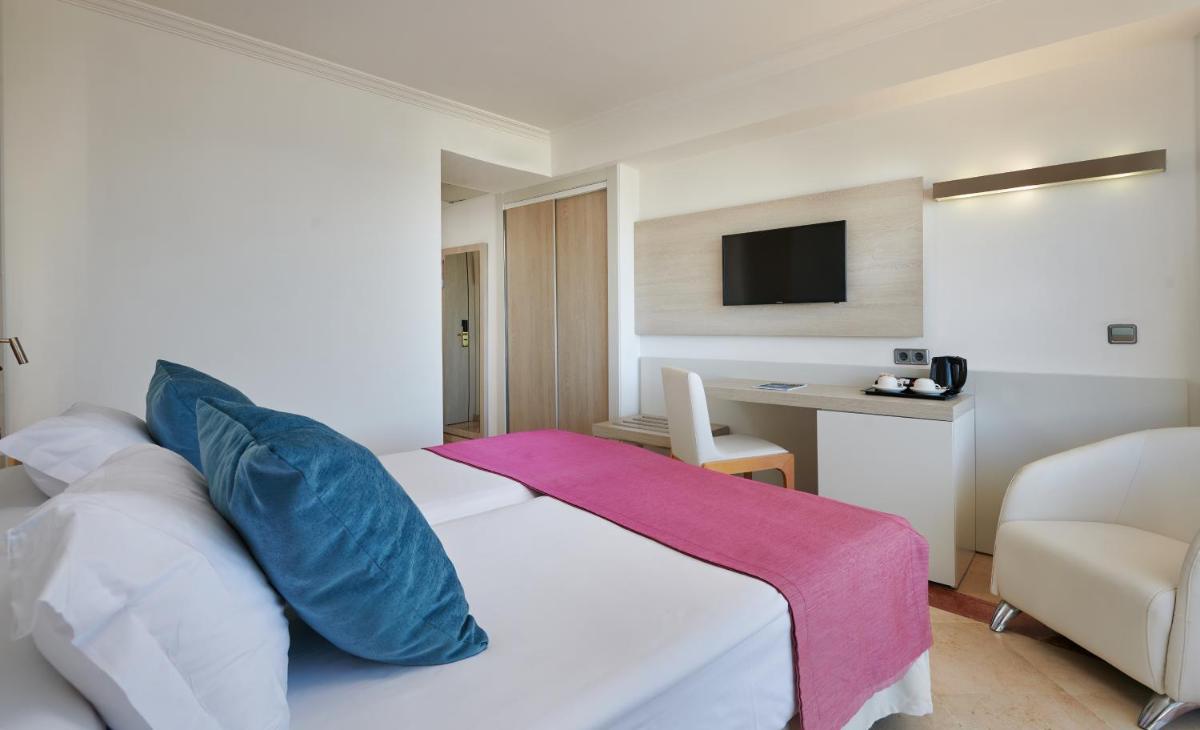 Cama o camas de una habitación en Grupotel Acapulco Playa - Adults Only