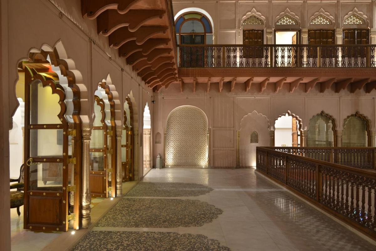 a hallway of a mosque with ornate architecture at Haveli Dharampura & Golden Haveli- UNESCO awarded Boutique Heritage Hotel in New Delhi a hallway of a mosque with ornate architecture at Haveli Dharampura & Golden Haveli- UNESCO awarded Boutique Heritage Hotel in New Delhi