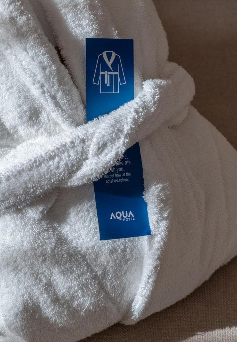 Cama o camas de una habitación en AQUA Hotel The Breeze & Spa - All Inclusive - Adults Only - 4Sup