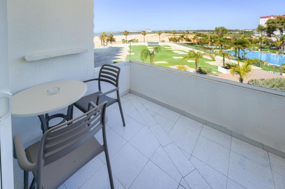 Un balcón o terraza de Hotel Puerto Bahía & Spa