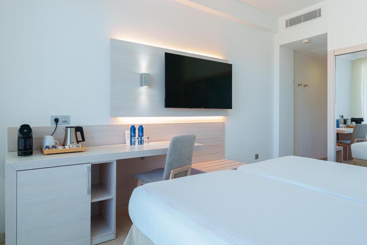 Cama o camas de una habitación en Ferrer Concord Hotel & Spa