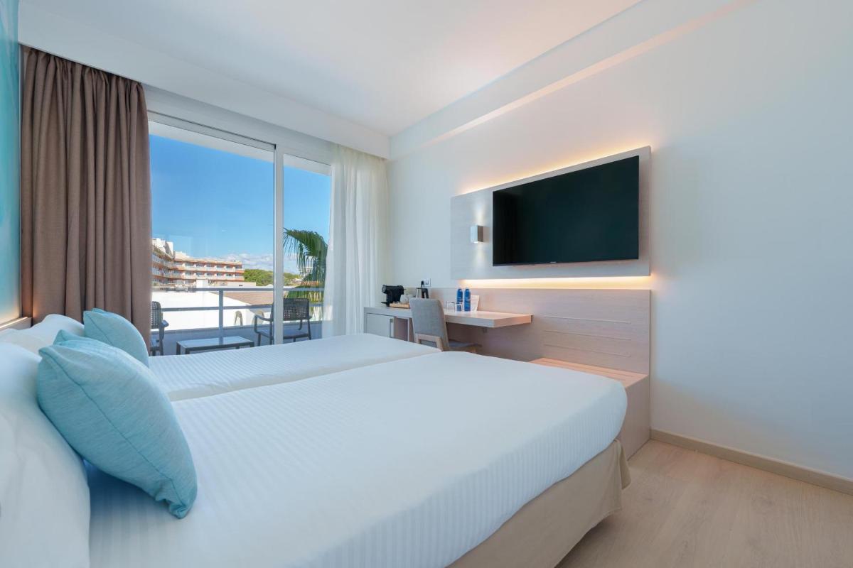 Cama o camas de una habitación en Ferrer Concord Hotel & Spa