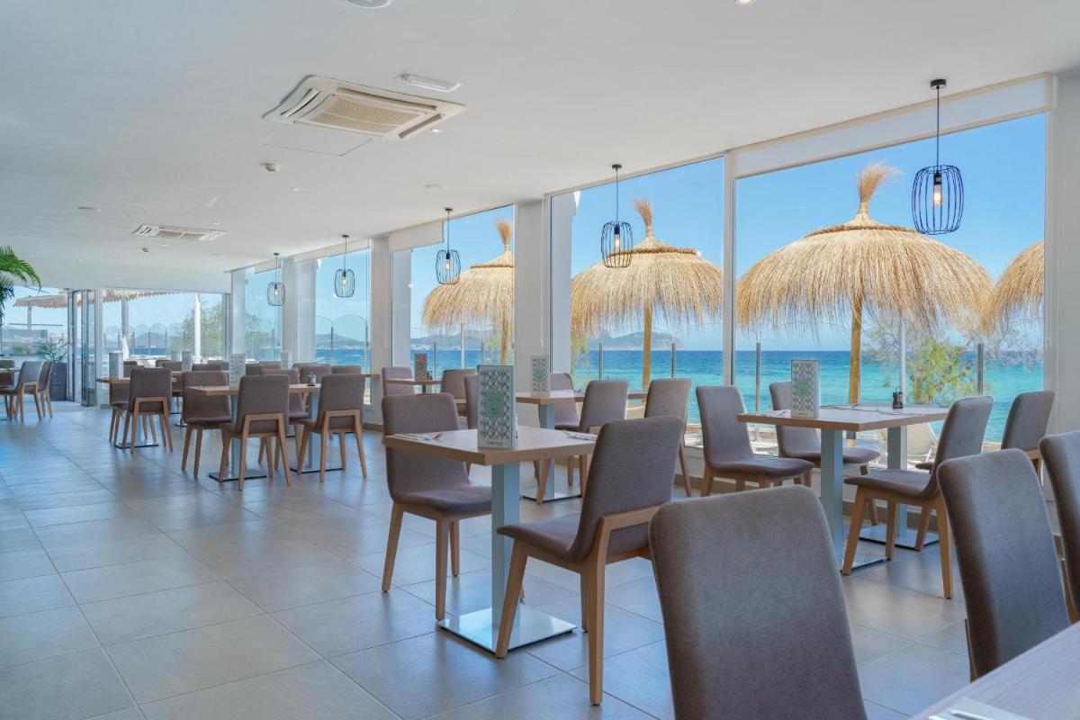 Un restaurante o sitio para comer en Ferrer Concord Hotel & Spa