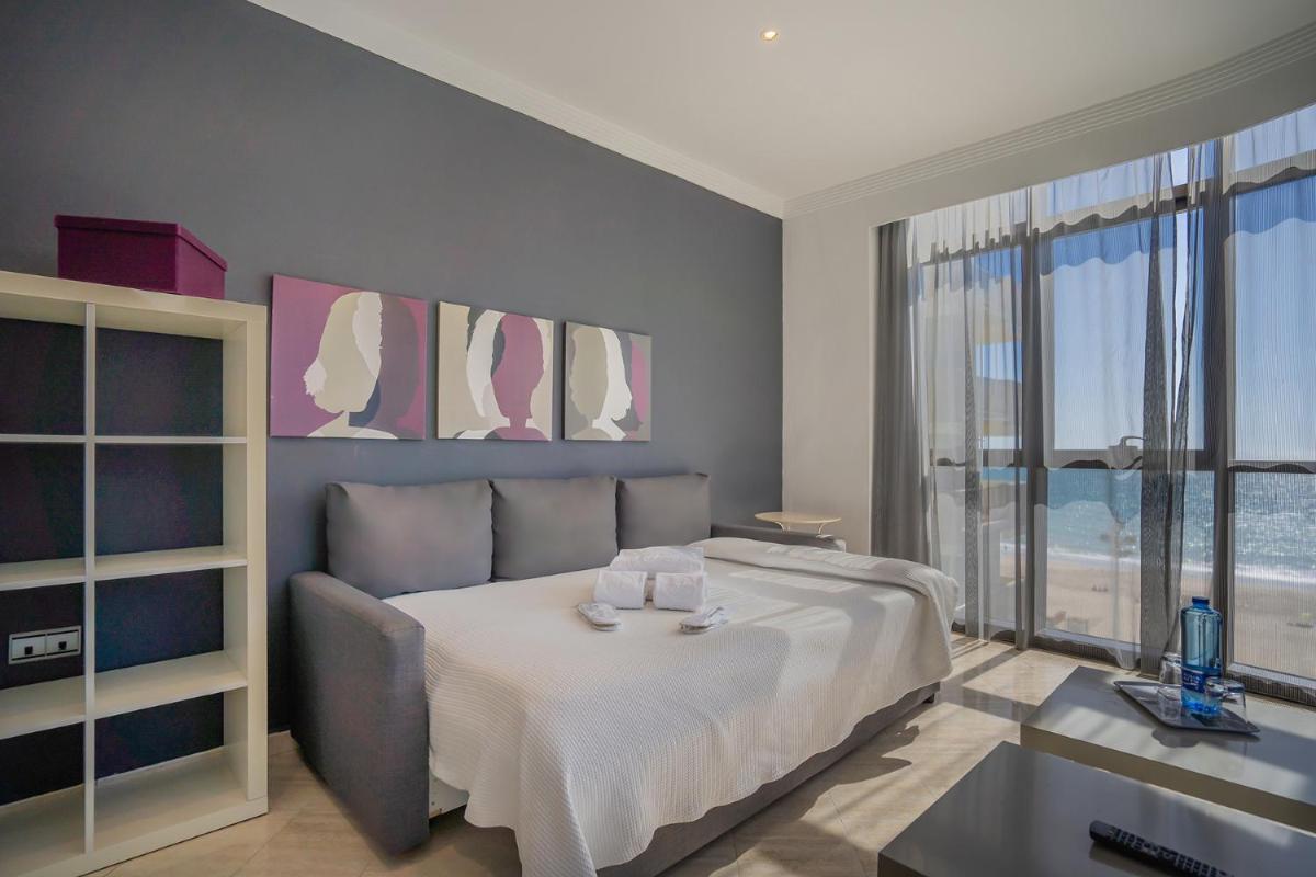 Cama o camas de una habitación en Hotel Spa Cádiz Plaza