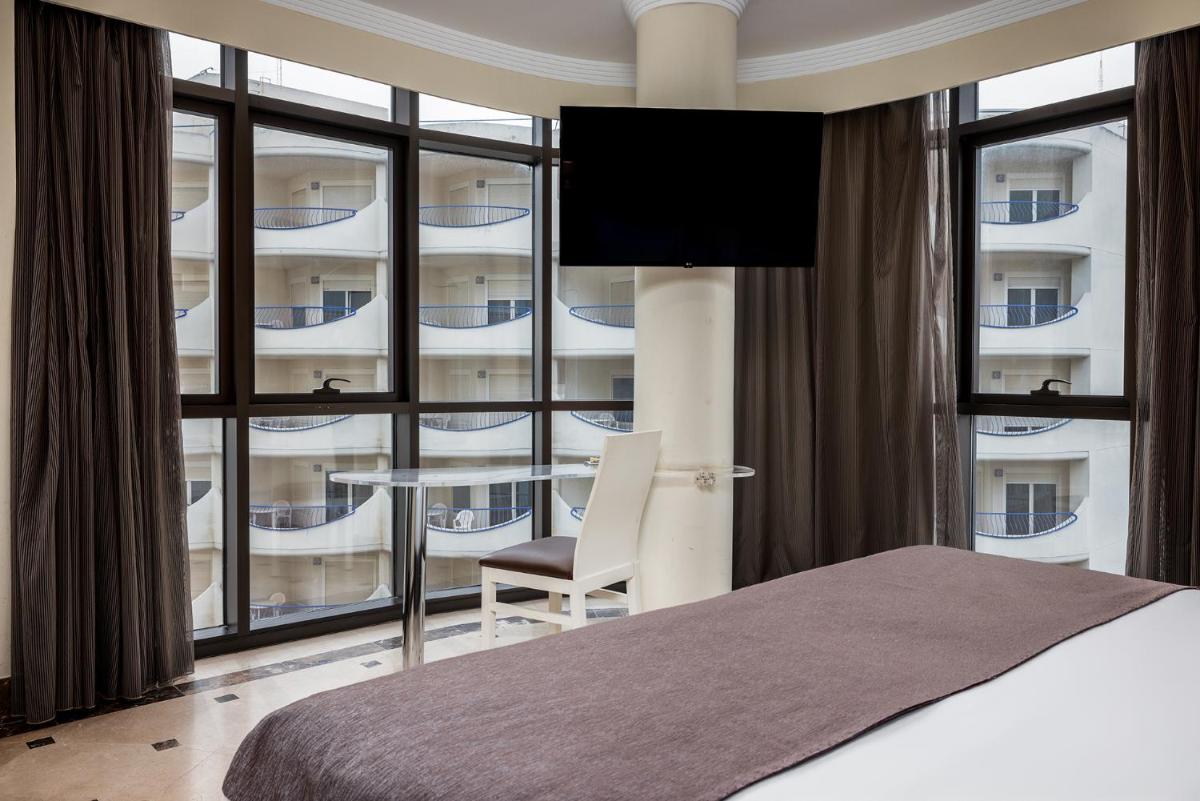 Cama o camas de una habitación en Hotel Spa Cádiz Plaza