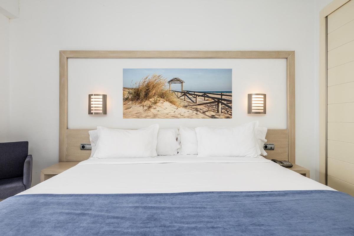 Cama o camas de una habitación en Hotel Spa Cádiz Plaza